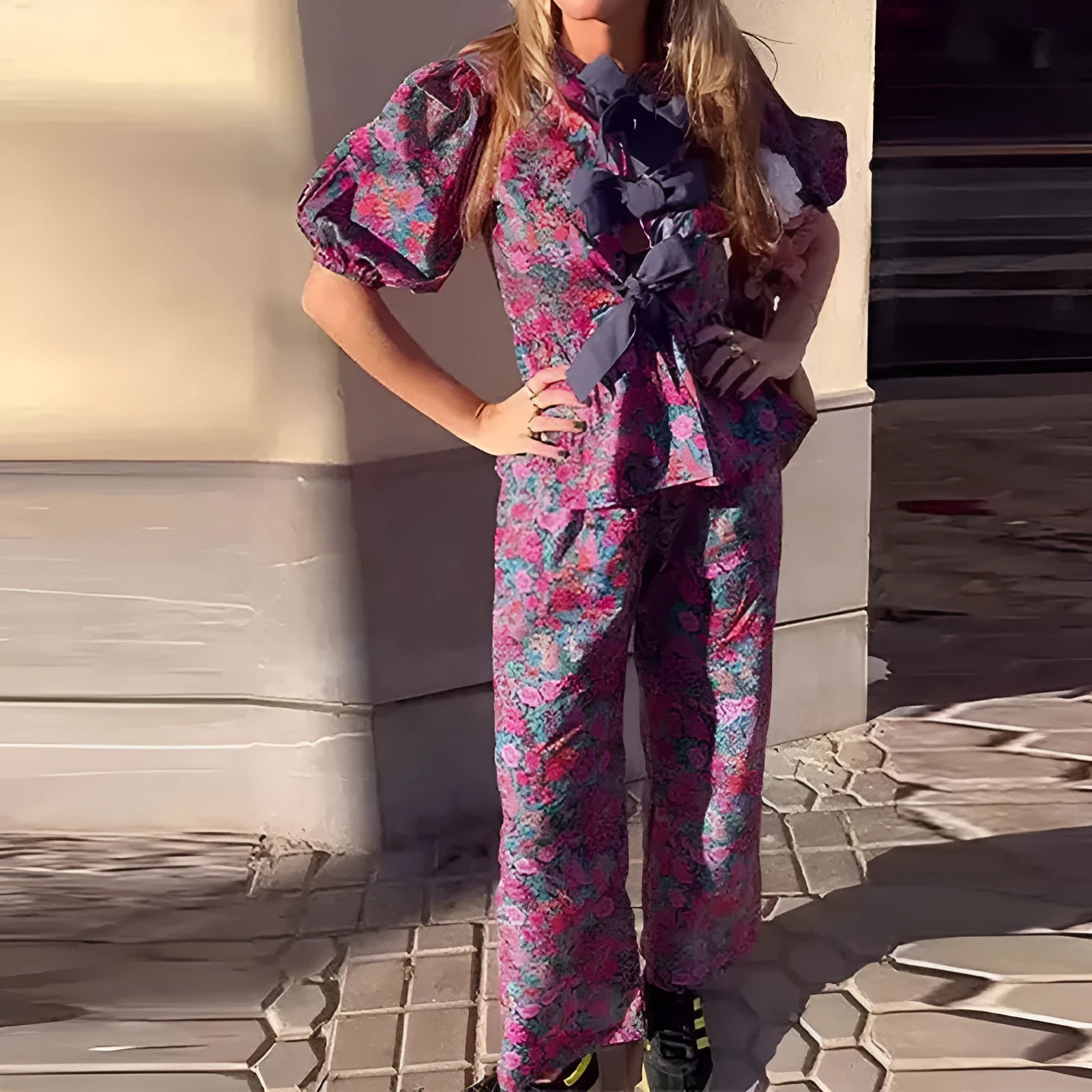 Floral print trousers suit with tie-neck puff sleeve blouse and matching trousers