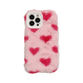 Pink silicone iPhone case with a cartoon design on the back.