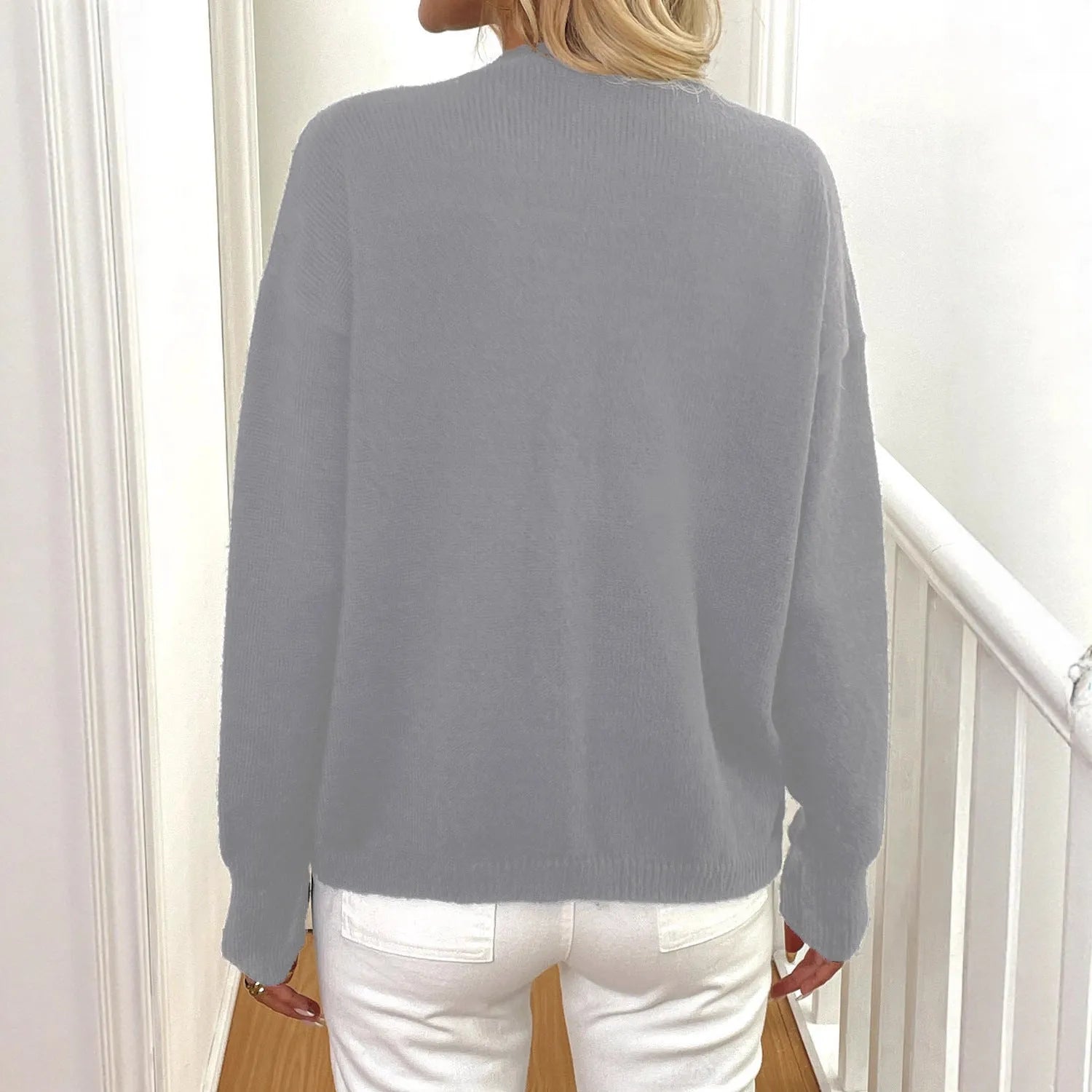 Women's deer plush long sleeve sweater coat with princess sleeves and irregular hemline in black or grey