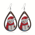 Wooden Christmas earrings showing Christmas tree and water drop snowman designs with geometric shapes