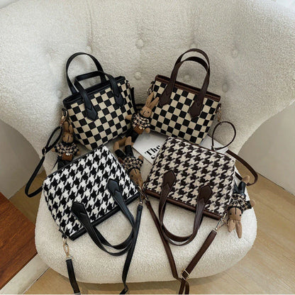 Stylish houndstooth shoulder bags in various colors, featuring a spacious square shape, adjustable strap, and classic checkerboard pattern.