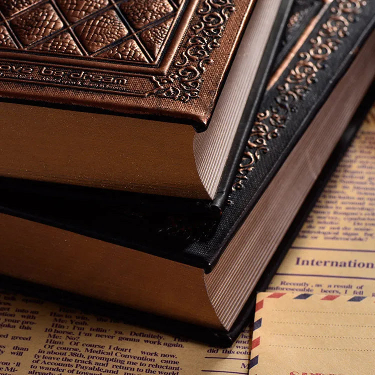 Embossed faux leather notebook with textured cover in bronze or black gold colour with thick writing pad