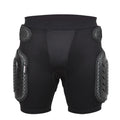 Black cycling hip protection pants with padding around the hip area, shown in sports context