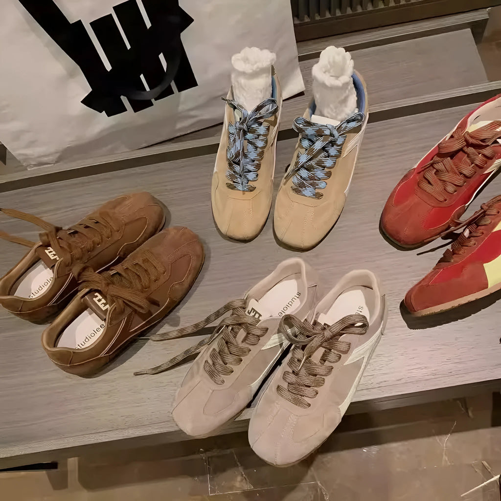 Women's retro suede sneakers in solid red, sand, brown, or milk grey with rubber outsole and height-increasing sole, sizes 35-40