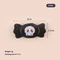 Plush cat teaser wand with candy-shaped attachment for interactive play