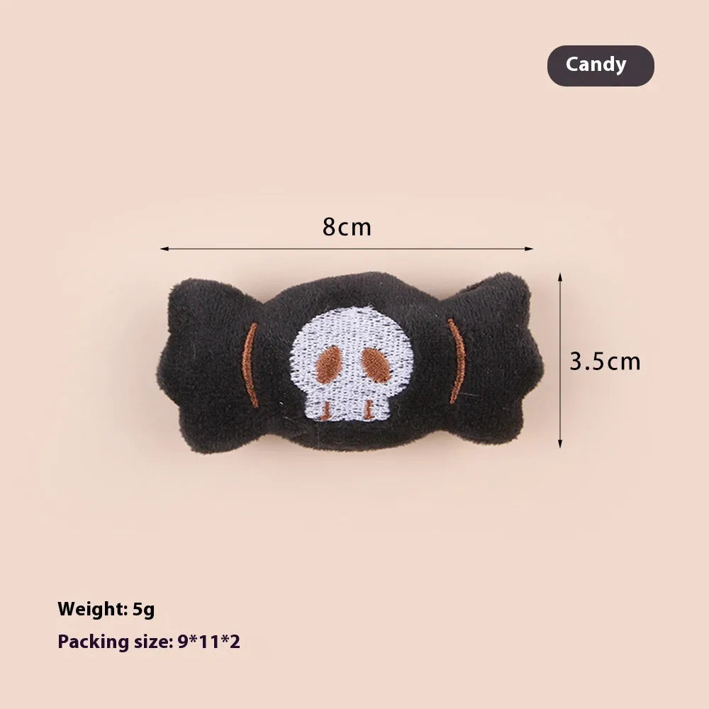 Plush cat teaser wand with candy-shaped attachment for interactive play