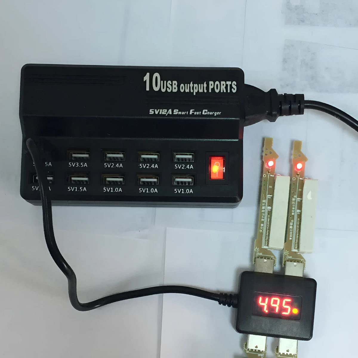 10 Port USB charger power strip in 838 black with multiple cables connected