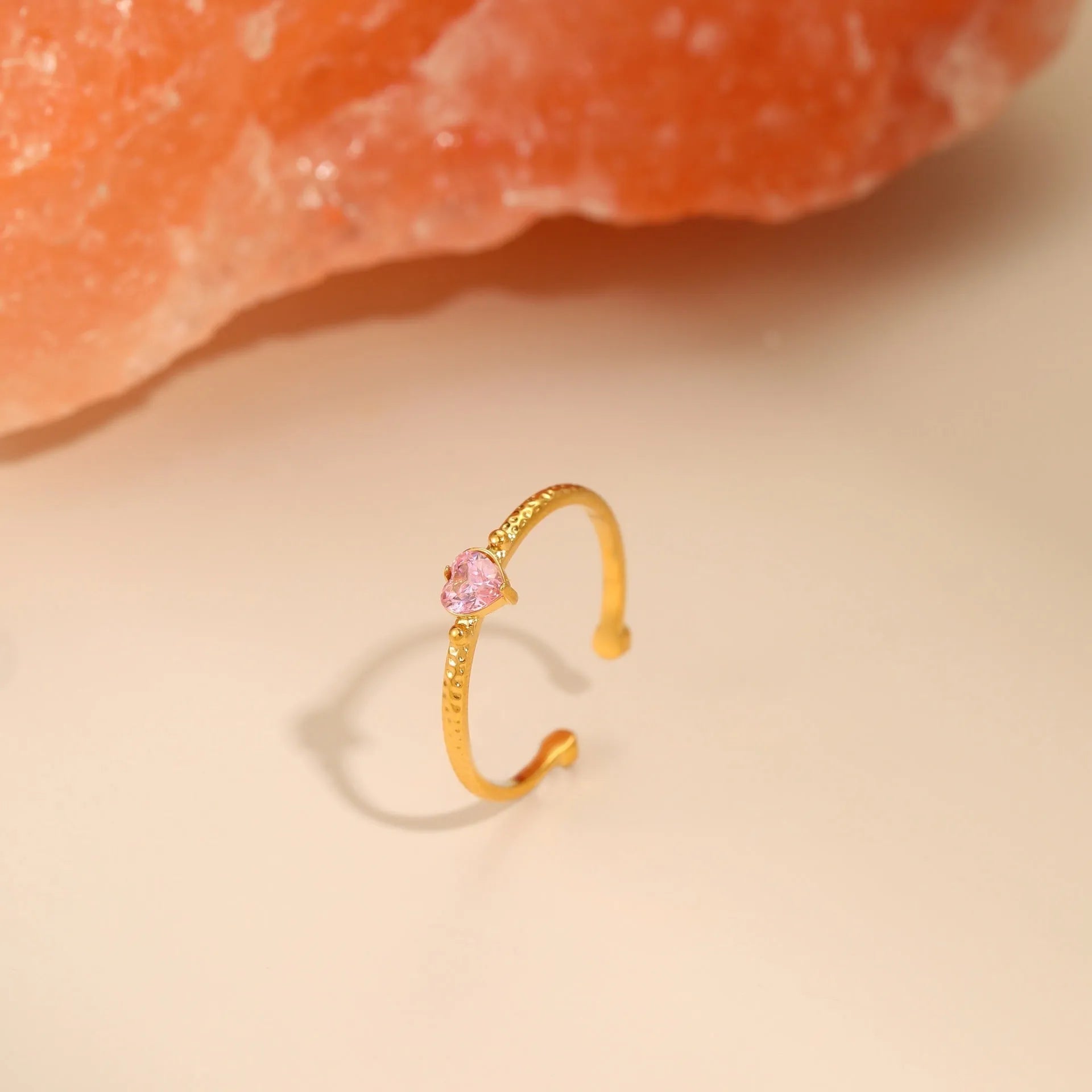 Open ended stainless steel ring with heart shaped geometric design and zirconium inlay in choice of colours