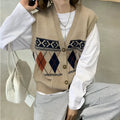 Khaki diamond plaid sleeveless loose cardigan top on a hanger.
