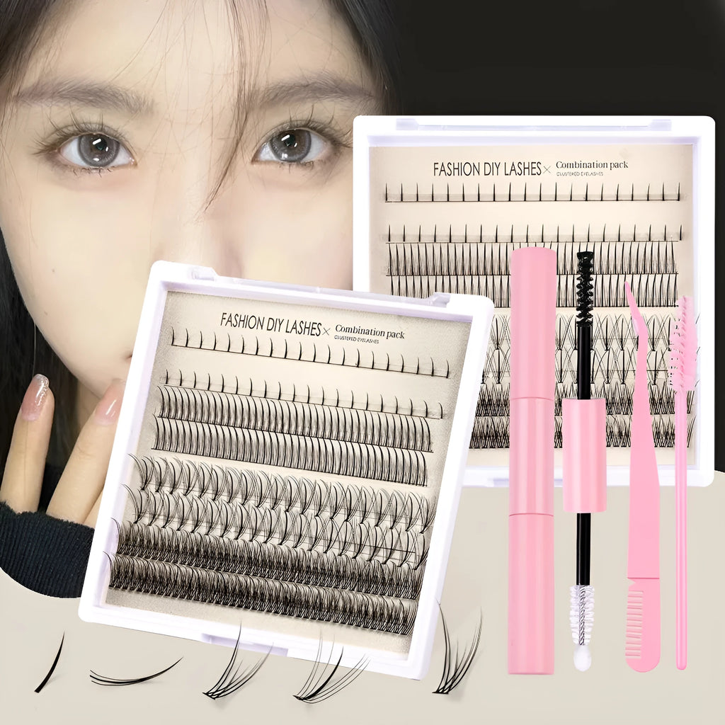 False eyelash kit with natural segmented clusters, adhesive tubes, tweezers and brushes on pink background