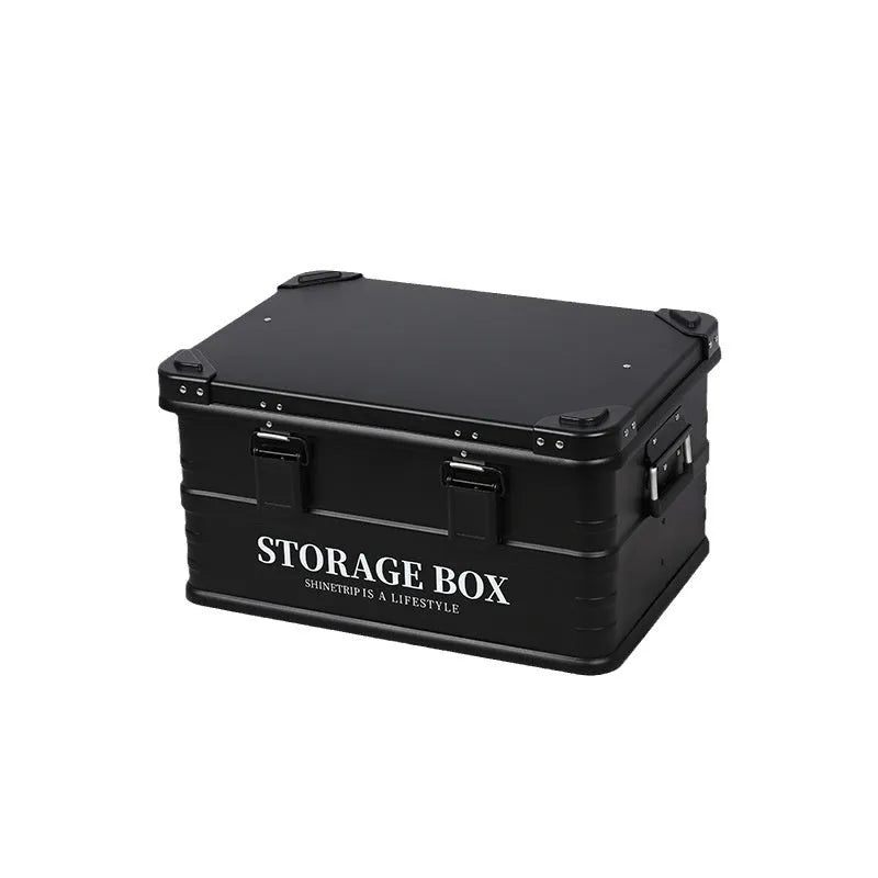Army green waterproof storage box mounted in a vehicle cargo area.