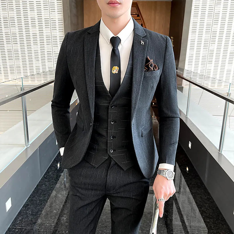 Slim fit men's business suit in black or dark grey with cotton blend fabric construction