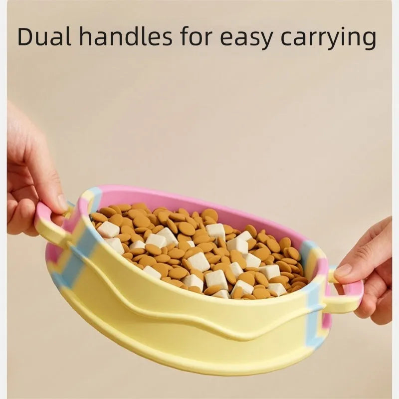 Colourful silicone slow food bowl with double-ear handles and maze interior for dogs and cats