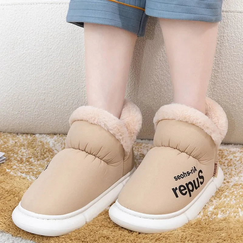 Warm house slippers with plush fleece lining and high back heel, shown in assorted colours.