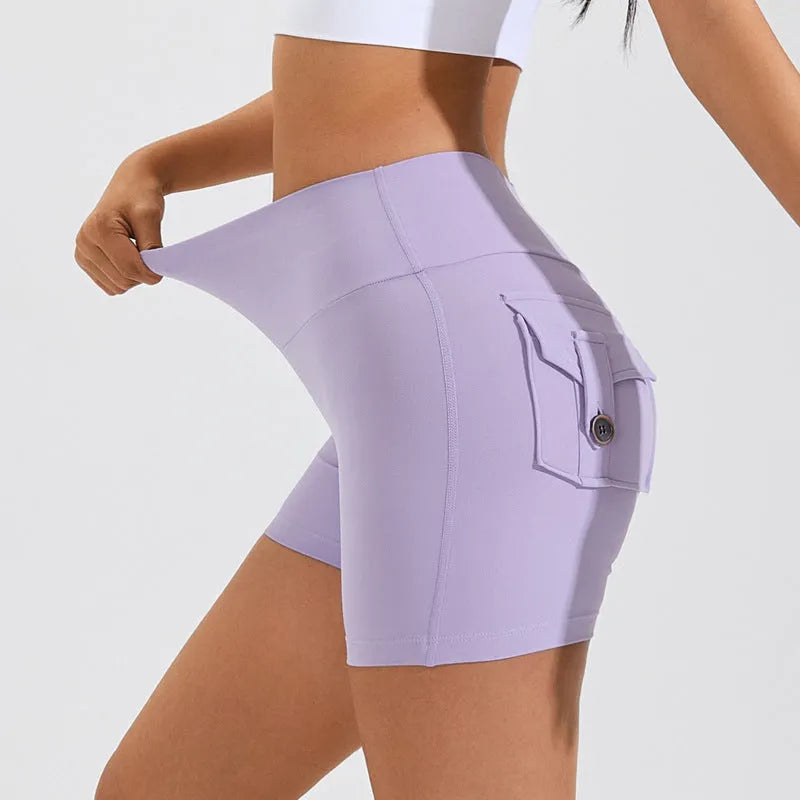 Women's high waist fitness shorts in quick dry nylon fabric with side pockets for summer sports