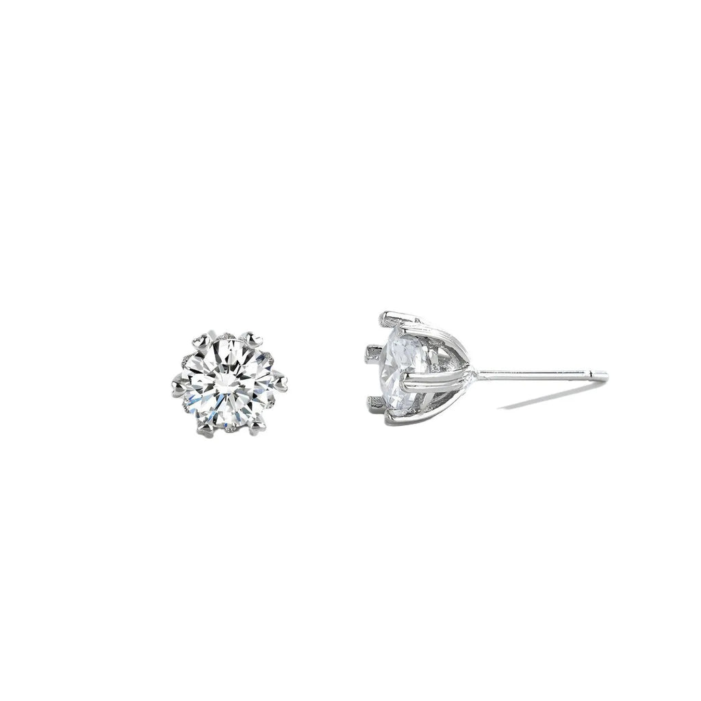 Silver brass zircon stud earrings heart shape hexagonal star design classic six-claw setting on white background