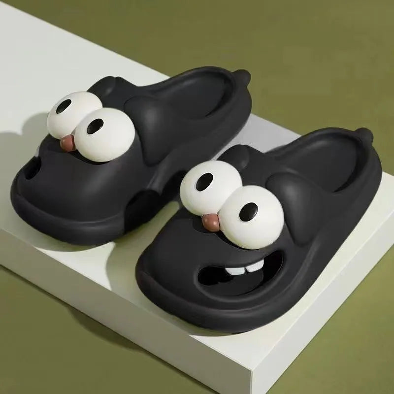 Pair of cartoon big eye dog PVC slippers for women in green colour
