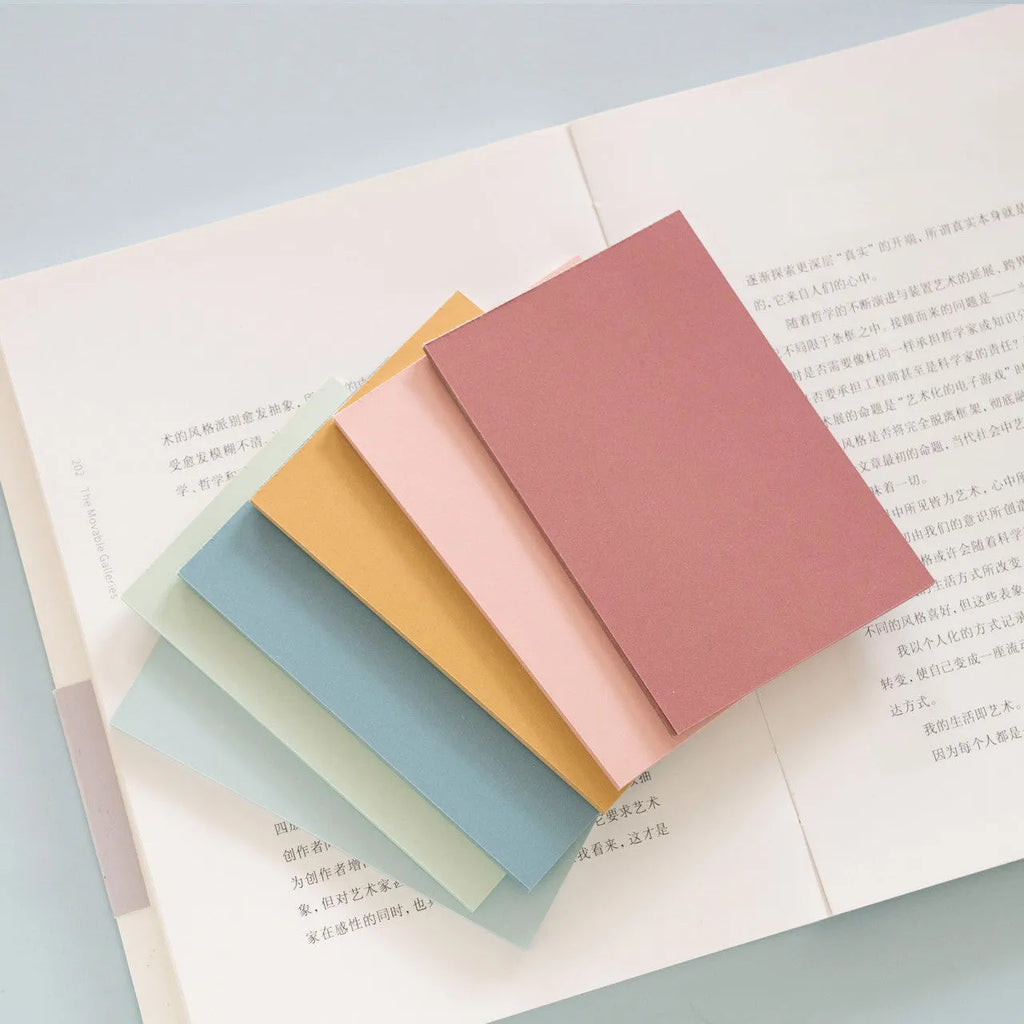 Large 12cm by 8cm colourful Post-it notes showing six different colours in a self-adhesive sticky note pack