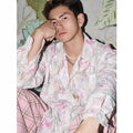 Pink floral long sleeve shirt with three-dimensional embossing pattern and loose fit design