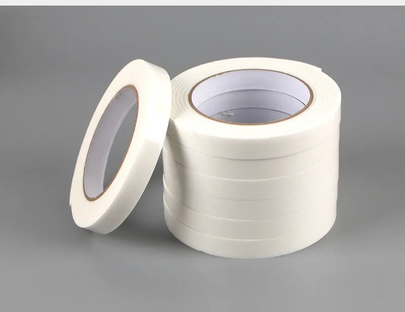 Roll of 3mm thick foam double-sided adhesive tape showing sponge core, with size options 15mm, 18mm, and 30mm wide.