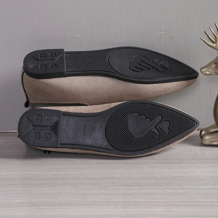 Beige leopard print pointed toe stiletto pumps for women, showing the shoe's side profile.