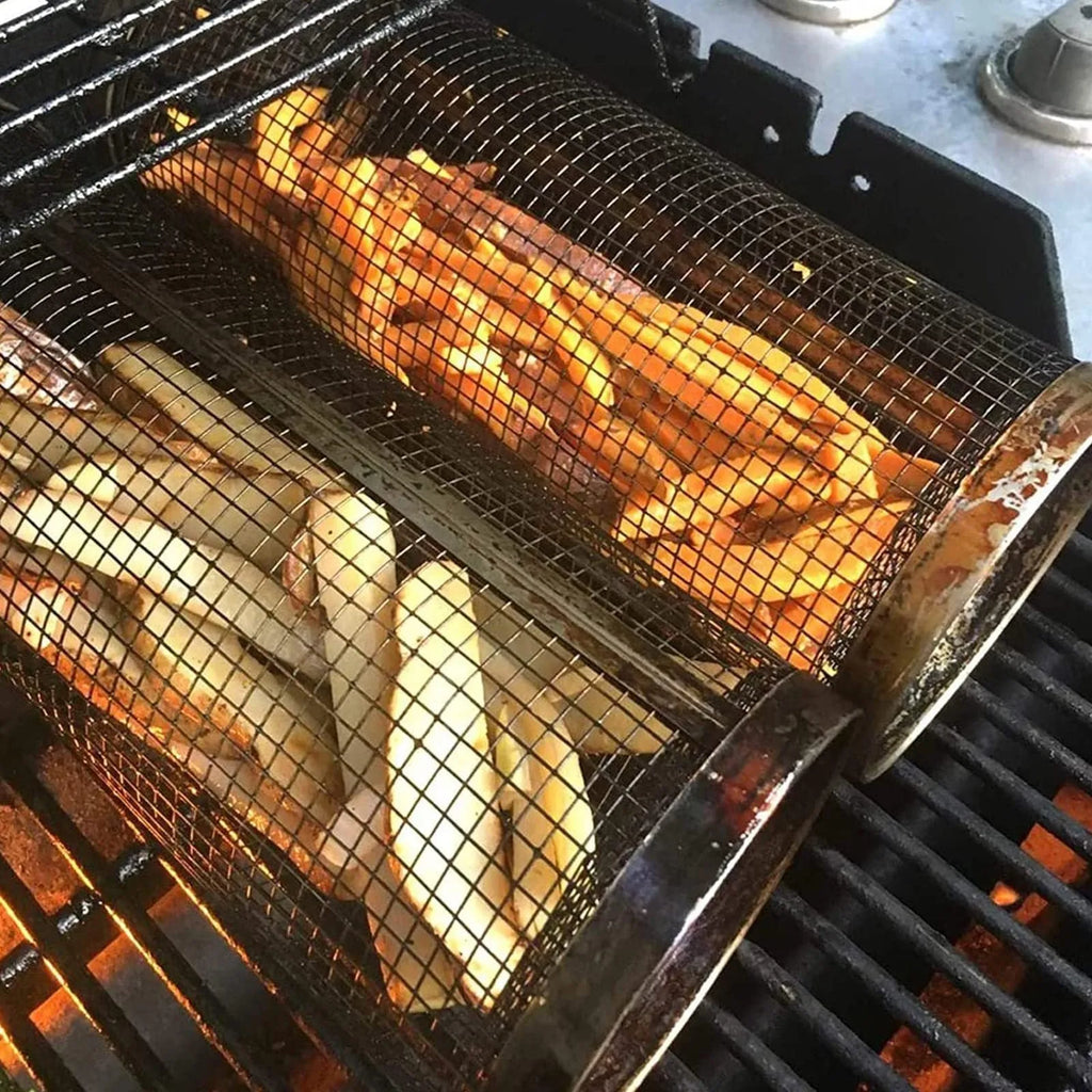 Round rolling metal barbecue grill basket with mesh sides and a handling hook, shown with BBQ gloves.