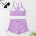 Purple women's high-waist split bikini swimsuit top and shorts set.