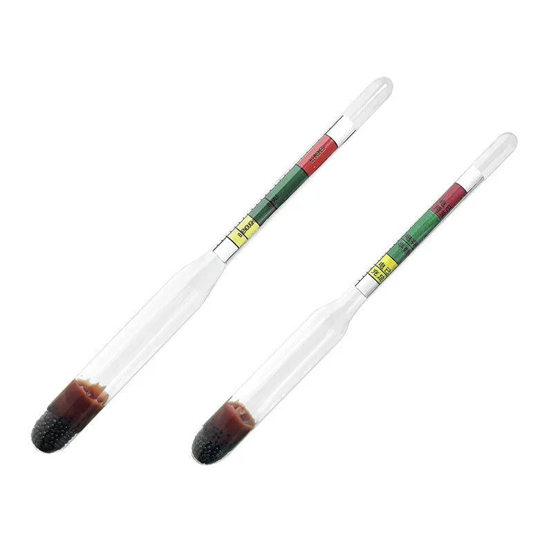 Glass automotive battery electrolyte hydrometer with red and black bulbs, 330mm long.