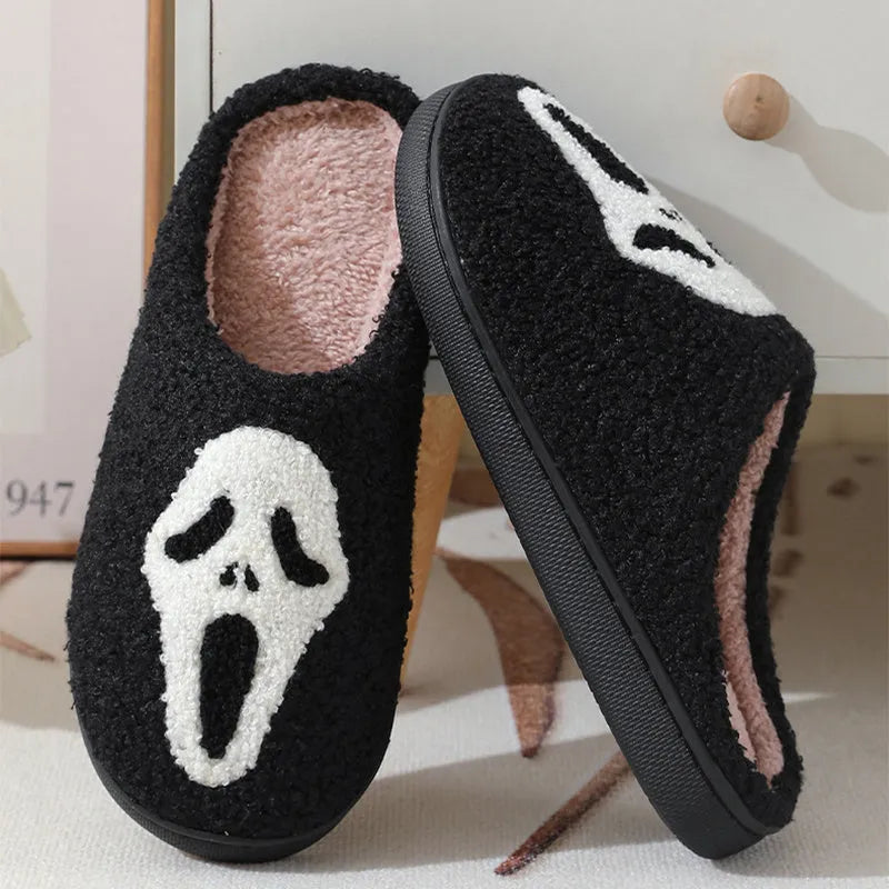 Halloween skull print indoor slippers with suede upper, cotton lining, and non-slip rubber sole in white, red, black, or red black.