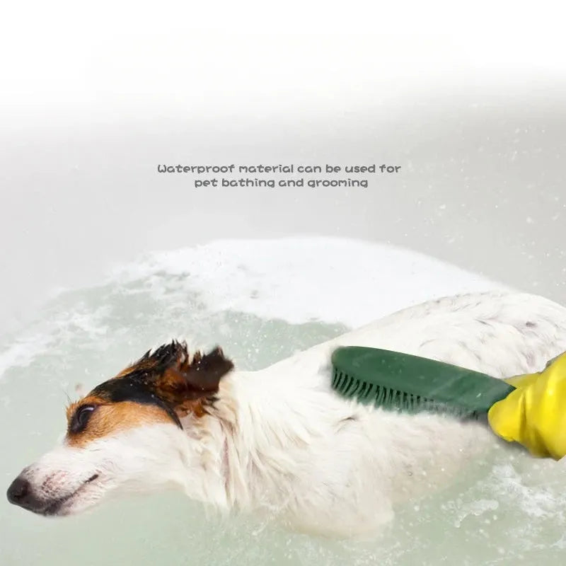Green pet grooming brush with rubber handle and flexible bristles for removing hair from dogs, cats and clothing