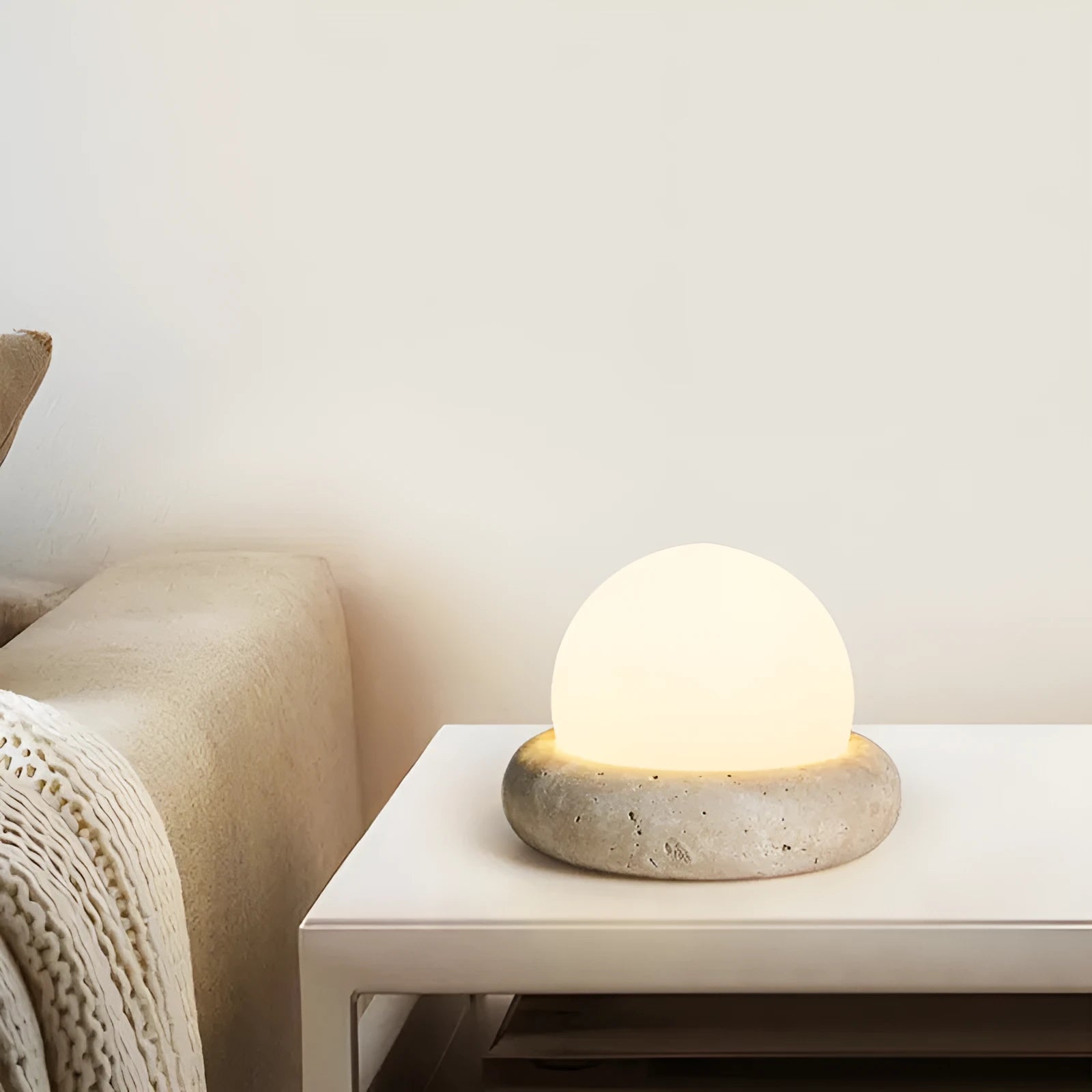 Cream remote control rechargeable bedside lamp with yellow cave stone glow