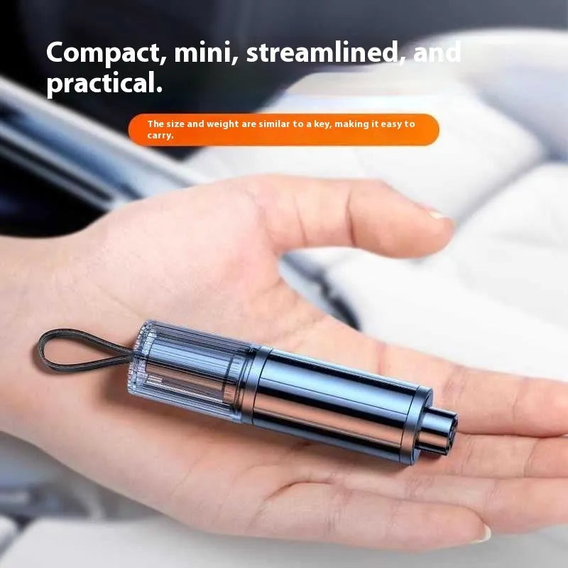 Black and red ABS plastic car safety life hammer with window breaker tip and seatbelt cutter.