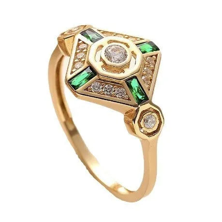 Square geometric emerald diamond ring in lvzuan colour on a model's finger.