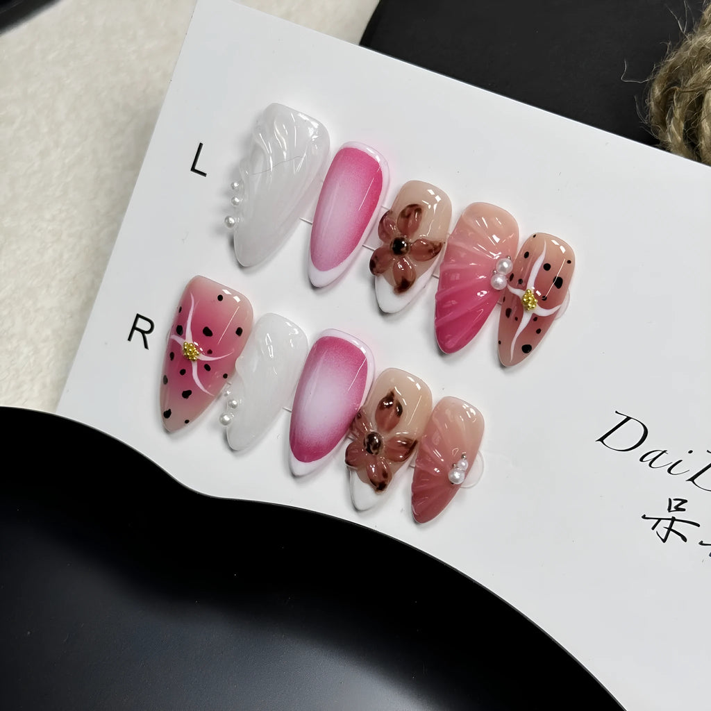 Hand-painted 3D nail art stickers with carved candy patterns in almond shapes