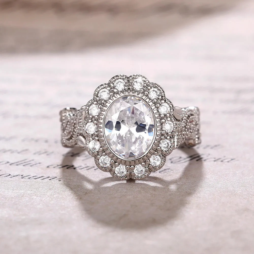 Round zircon ring with diamond copper plating in white gold colour on finger