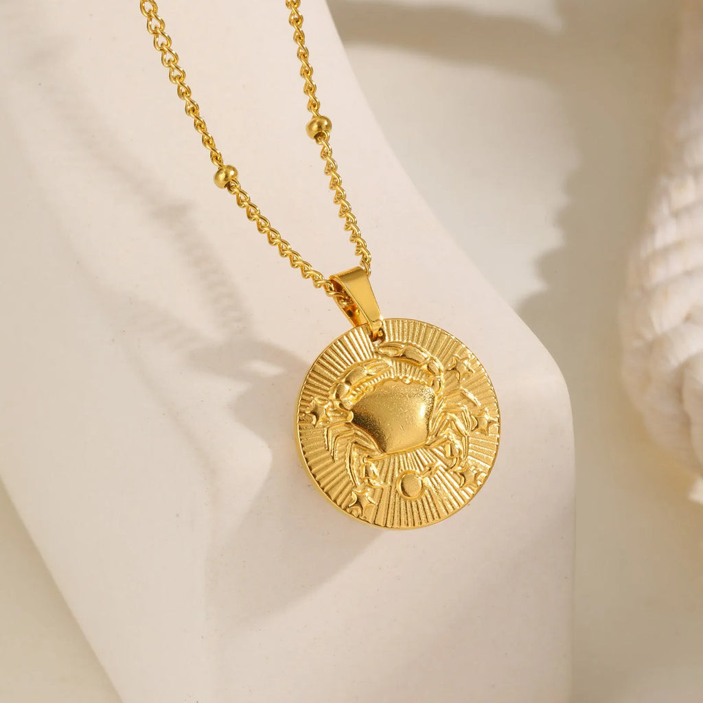 Stainless steel zodiac constellation bead necklace with twelve star signs on round geometric pendants and cross chain