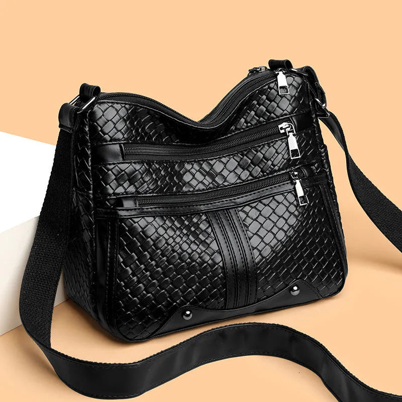 Woven PU leather messenger bag with multiple compartments and single shoulder strap