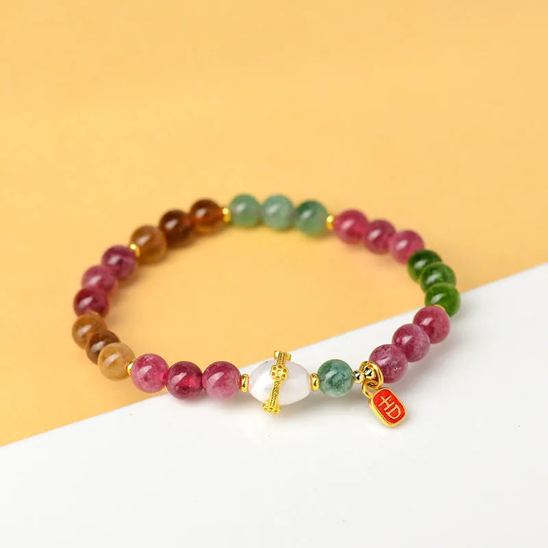 Chalcedony and tourmaline unisex crystal bracelet with 6.5mm geometry beads in colour Z054.