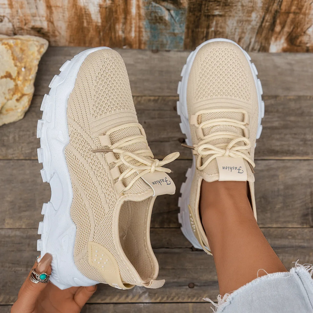Women's Flyknit mesh casual sports shoes in multiple colours, showing lace-up design and flat sole.