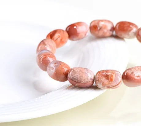 Natural cherry blossom colour agate barrel bead bracelet with Ruyi design elements