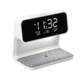 White 3-in-1 bedside lamp with wireless charging pad, LCD display, and ABS lampshade