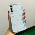Transparent Samsung TPU phone case with three-dimensional bowknot design in blue, pink or purple bow options.