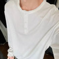 Black men's Henry collar long-sleeved pullover top, loose fit, polyester blend fabric