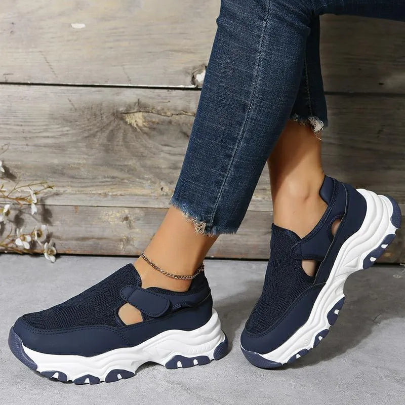 Women's mesh sport shoes with round toe, low heel, and Velcro fastening in a solid colour