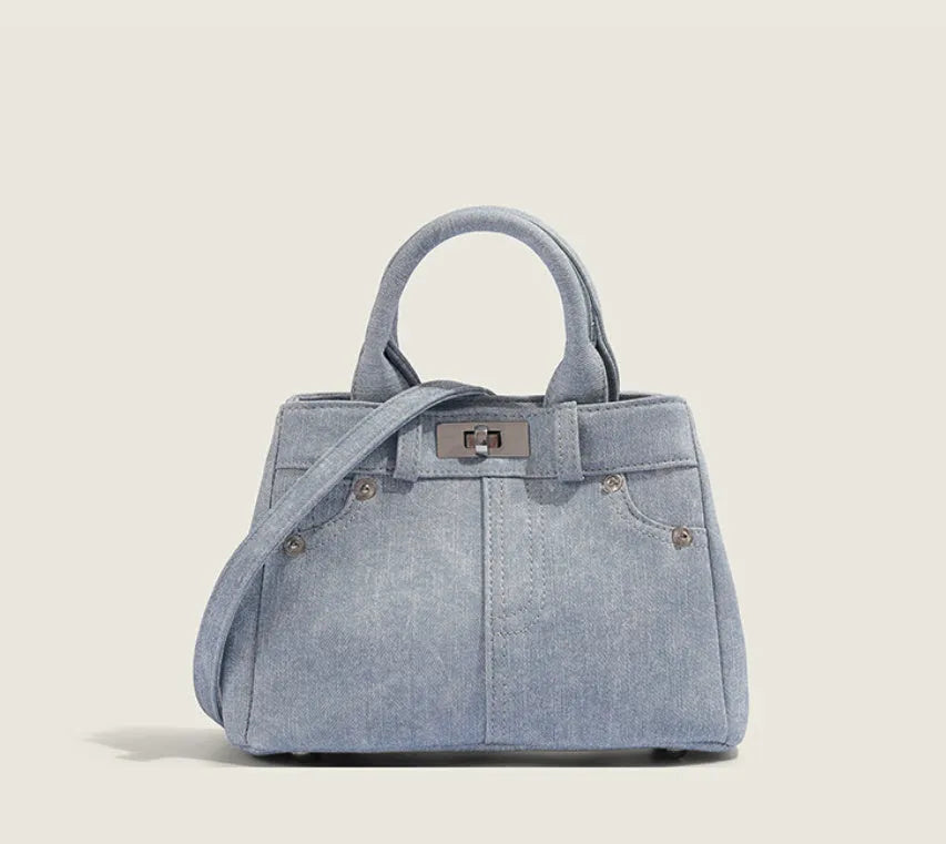 Women's casual shoulder bag made from soft PU material in denim blue colour with standard size dimensions
