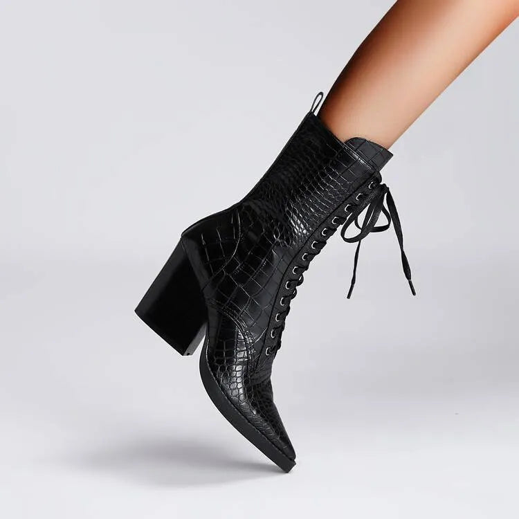 Dark brown retro pointed toe boots with a chunky heel and lace detail, side zipper visible.