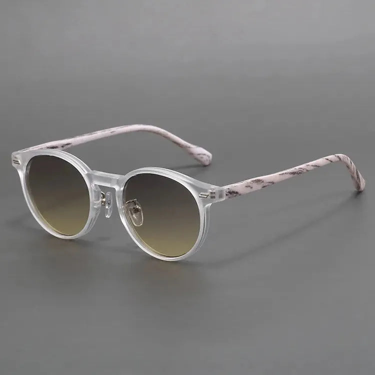 Retro frosted round rim sunglasses in multiple colour options for UV protection.