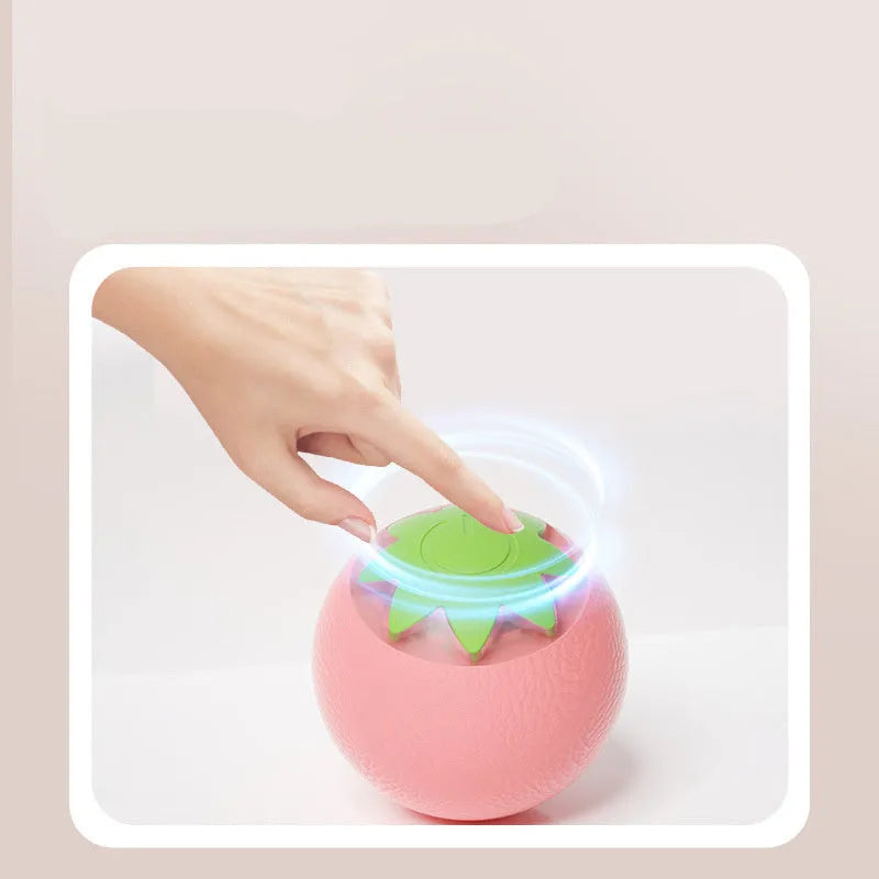 Green electric rolling ball toy for dogs and cats measuring 4.5cm