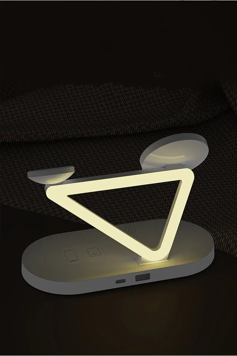 Black wireless charging station showing an iPhone, Apple Watch, and AirPods charging simultaneously on magnetic pads.