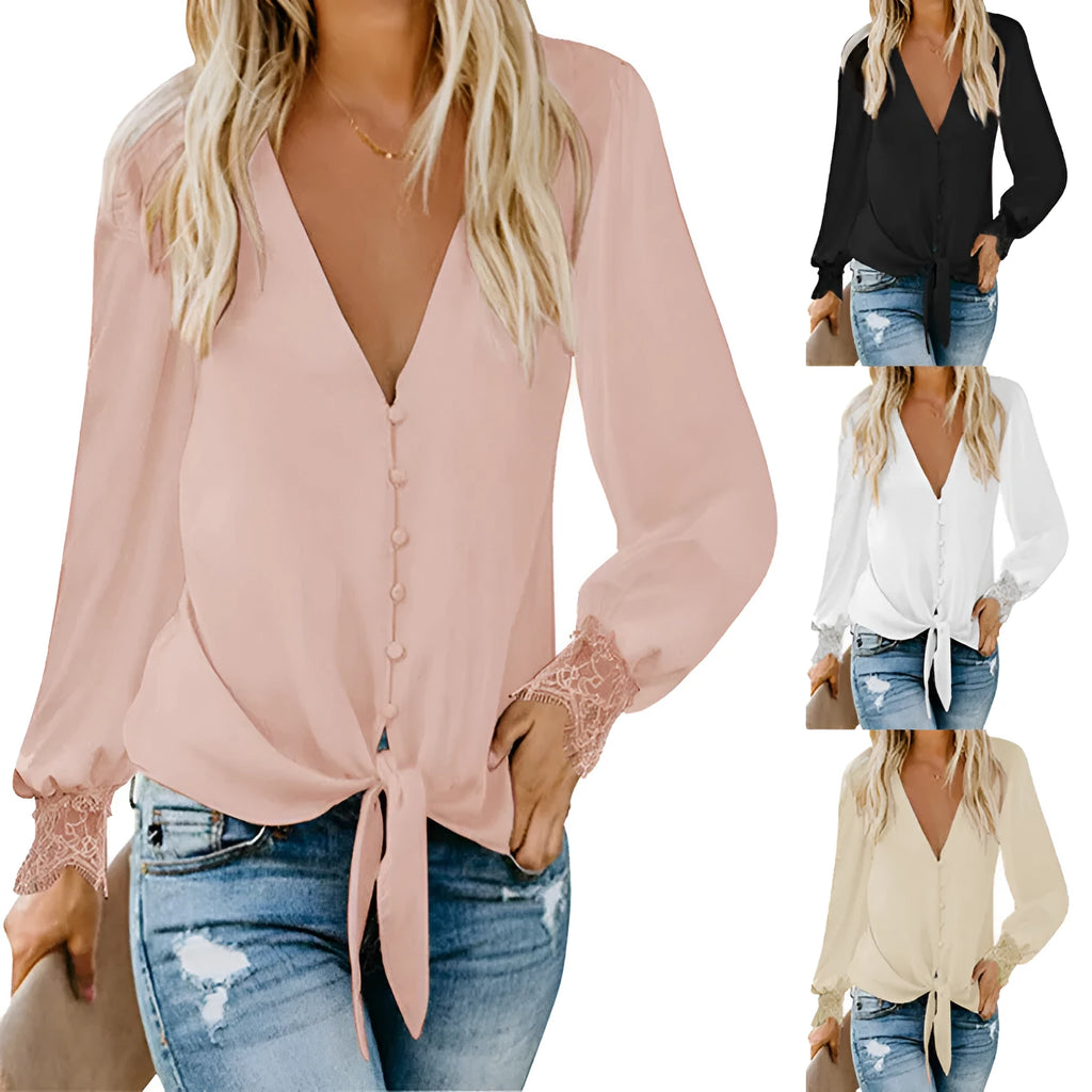 V-neck loose-fitting top with a lace-up detail at the hem, shown in a solid colour.